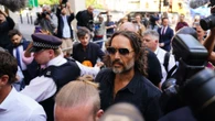 Russell Brand raped woman in hotel & 'sloppily' kissed radio worker, court told