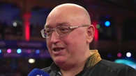 Sky host can't keep straight face at darts ace Gilding's answer to question