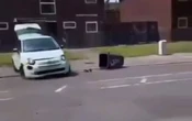Moment Fiat 500 does DONUTS & speeds backwards as 60 masked youths spark chaos