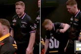 Moment darts star awkwardly falls off stage moments after superb checkout