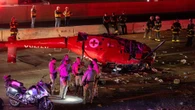 Moment helicopter smashes into freeway leaving 3 injured in dramatic footage