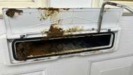 Moment mystery 'neighbour from hell' stuffs POO through couple's letterbox