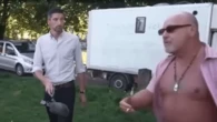 Watch moment furious man clashes with local and interrupts BBC news report