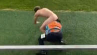 Shocking moment steward wrestles streaker and ends up with BUM in his face