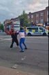 Moment thugs use STICKS & baseball bats as brawl erupts on busy high street