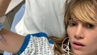 Suki Waterhouse reveals she's in hospital with injury caused by 'tight trousers'