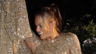 JoJo Siwa stuns in gold mini dress as she hints at MARRYING Chris Hughes
