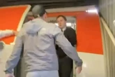 Moment EasyJet passenger screams abuse at flight crew before he's SLAPPED