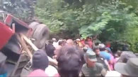 At least 21 killed after bus plummets down mountain by popular waterfall