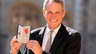 Alan Hansen receives MBE from Prince William nine months after health scare