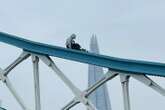 Tower Bridge CLOSED as man climbs up iconic landmark & sits on railings