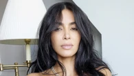 Kim Kardashian goes topless and wears just necklace and jeans for shoot