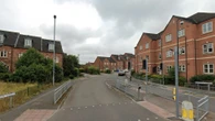 Man and woman seriously injured by 'XL Bully' as cops cordon off street