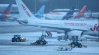 Major UK airport used by 74k a day stops ALL flights to clear 'heavy snow'