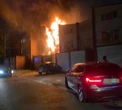 Neighbour smashed through burning home to help save 2 from blaze that killed 4