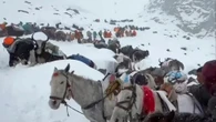 Fears final 200 hikers still trapped on Everest will be buried alive by snow