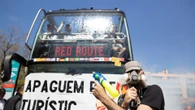 Anti-tourist mob attacks holidaymakers with water guns ahead of mass protests