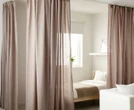My £3 Ikea buy makes bedroom look like a luxury hotel & it's easy to put up