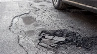 Thousands left with big repair bills after hot weather makes potholes worse