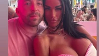 Katie Price almost bursts out of barely there strapless bikini on boozy holiday