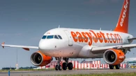 EasyJet chaos as woman grabs plane door & screams 'bomb' on Manchester flight