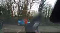 Moment 'cash-for-crash' idiot rolls himself over car bonnet in shameless dashcam