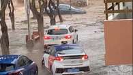 Spain ravaged by floods as cars washed away & tourists are told 'stay inside'