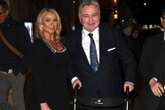 Eamonn Holmes, 65, leans on his walker on date night with girlfriend, 43