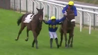 Crazy moment jockey goes 'horse skating' in middle of race after falling off