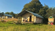 One of the UK's best campsites has safari lodges, pet pigs and secret waterfalls