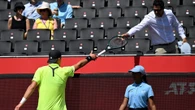 Tennis star's racquet almost flies into Queen's fan in shocking scenes