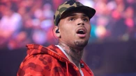 R&B star Chris Brown 'hit producer several times with bottle in London club'