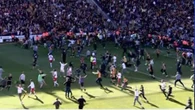 Bradford clash SUSPENDED with club seconds from promotion as fans storm pitch