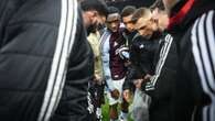 Aston Villa stars anxiously huddle round phone to check Champions League scores