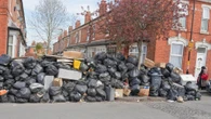 Bin staff reject 'inadequate' deal to end month-long strike over pay