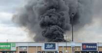 Massive fire engulfs UK shopping centre as plume of smoke billows into sky