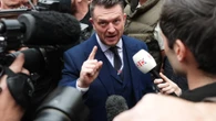 Tommy Robinson arrives for 'terror' trial after being stopped at Channel Tunnel