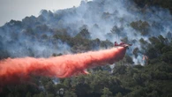 Raging blazes force major airport to SHUT as residents evacuated