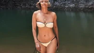 Halle Berry, 58, channels famous Bond Girl role as Jinx as she strips to bikini