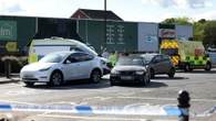 Woman dead & three, including child, injured after car hits pedestrians