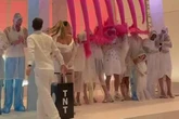 Watch couple's 'mad' & messy OTT gender reveal that sends mum flying