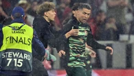 Major security breach as Cristiano Ronaldo is grabbed by pitch invader