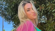 World’s sexiest volleyball star Kayla Simmons spills out of tiny bikinis