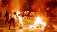 Swiss city descends into migrant chaos with burnt buses over teen's death
