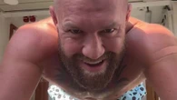 Conor McGregor shows off bizarre new hair after whisking fiancee away