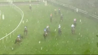 Race dramatically stopped as horses and jockeys are pelted with 'painful' hail