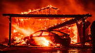 Two dead in 'growing' LA fires with 1k buildings destroyed and looters arrested