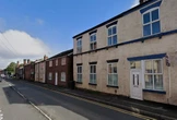 Man, 41, found dead inside house as two women, 21 & 42, among three arrested