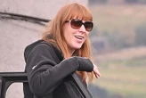 Rayner is all smiles as she's pictured for first time since resignation