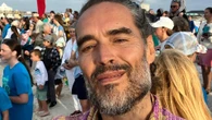 Russell Brand gets VIP treatment after flying first class from US back to UK